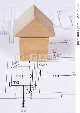 House of wooden blocks on construction drawing House of wooden blocks on construction drawing 35413275