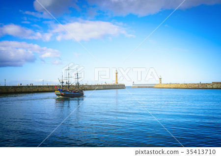 Classic boat on Whitby harbour in Whitby abbey 35413710