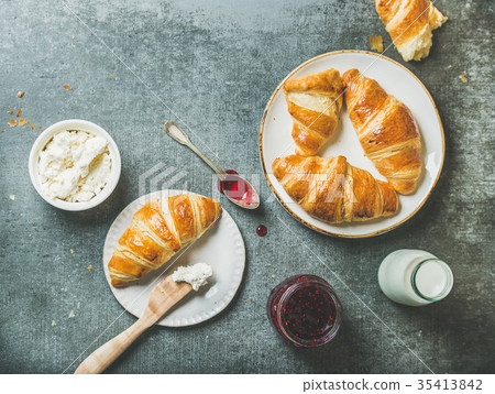 Freshly baked croissants with jam, cream-cheese Freshly baked croissants with jam, cream-cheese 35413842