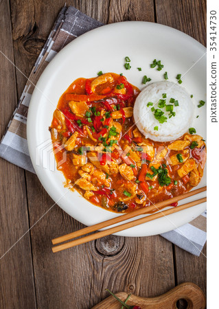 Chinese chicken with vegetables and rice. Chinese chicken with vegetables and rice. 35414730