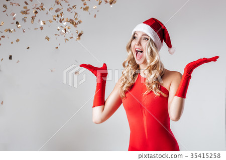 happy enthusiastic  Santa girl 35415258