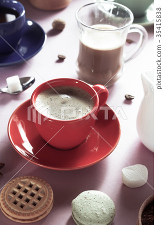 cup of coffee, tea and cacao at purple background cup of coffee, tea and cacao at purple background 35415838