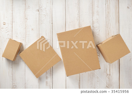 cardboard box on wooden background 35415956