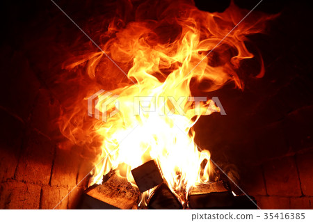 Long tongues of flame of burning fire Long tongues of flame of burning fire 35416385