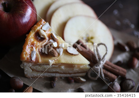 Delicious pastry with cinnamon and fruit  35416415