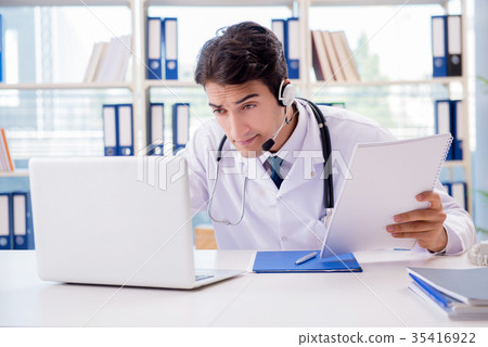Young male doctor in telehealth concept Young male doctor in telehealth concept 35416922