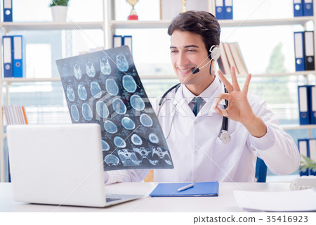 Young male doctor in telehealth concept Young male doctor in telehealth concept 35416923