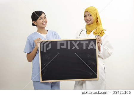 female doctor and nurse 35421366