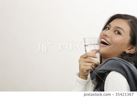 woman with glass of drinking water woman with glass of drinking water 35421367