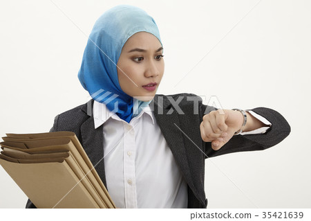 malay business woman checking time 35421639