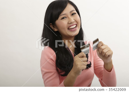 woman showing credit being destroy 35422009