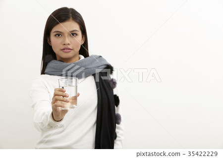 woman with glass of drinking water 35422229