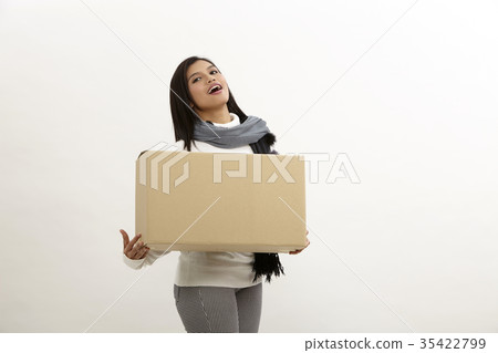 woman holding a box 35422799