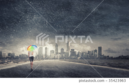Woman with rainbow umbrella Woman with rainbow umbrella 35423963
