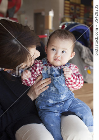 Baby mom and girl infant smile Baby mom and girl infant smile 35429235