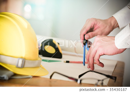 Hands of Engineer working on blueprint, Image of engineering. 35430187