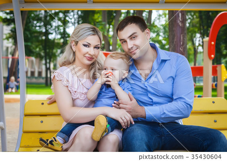 good family walking in park good family walking in park 35430604