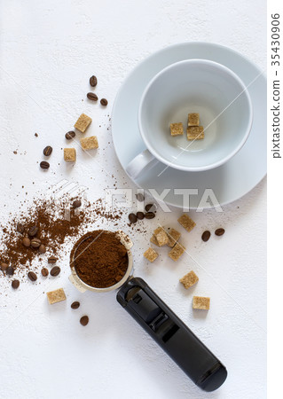 Ingredients for coffee: ground coffee in the horn Ingredients for coffee: ground coffee in the horn 35430906