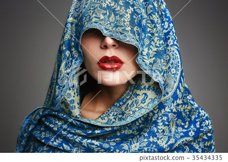 blue scarf covers woman face blue scarf covers woman face 35434335