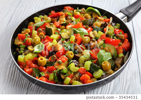 Italian Caponata with vegetables on skillet Italian Caponata with vegetables on skillet 35434531