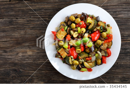 tasty Caponata with vegetables on plate tasty Caponata with vegetables on plate 35434545
