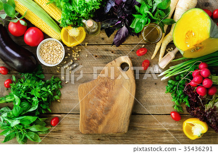 Vegetables on wooden background. Herbs, basil Vegetables on wooden background. Herbs, basil 35436291