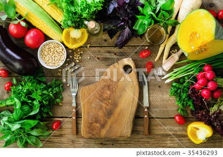 Vegetables on wooden background. Herbs, basil Vegetables on wooden background. Herbs, basil 35436293