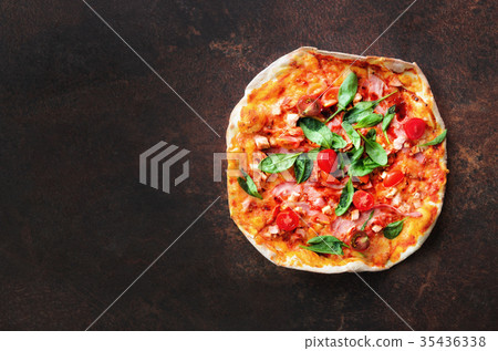 Homemade pizza. Top view with copy space on dark Homemade pizza. Top view with copy space on dark 35436338