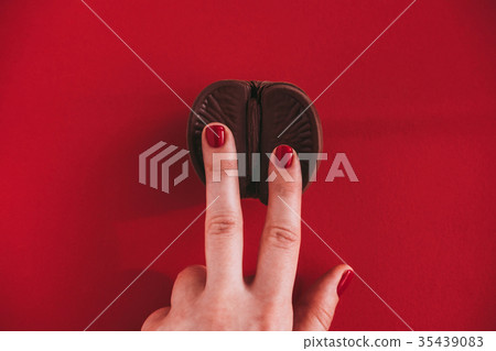 Vagina concept on red background 35439083