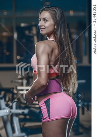 Sexy athletic young girl butt ass - Stock Photo 35442051