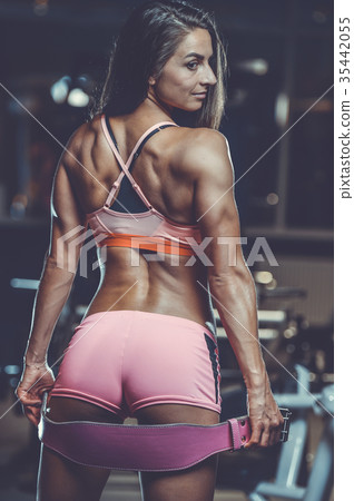 Sexy athletic young girl training back in gym 35442055