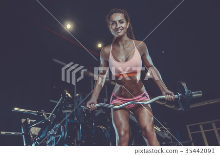 Sexy athletic young girl training back in gym 35442091