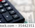 Calculator and money 35442351