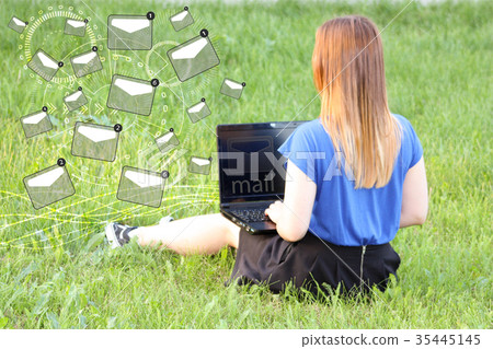 mail icon symbol. laptop and girl on green 35445145