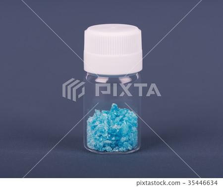 Blue crystal of methamphetamine in a glass jar Blue crystal of methamphetamine in a glass jar 35446634
