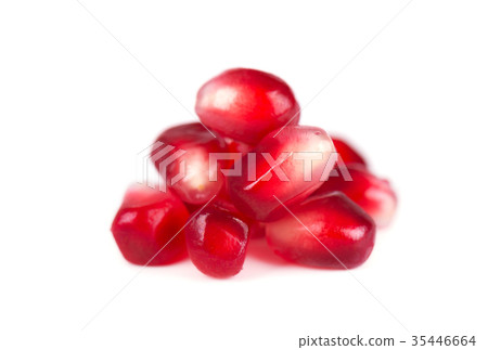 Fresh seeds of pomegranate isolated on white Fresh seeds of pomegranate isolated on white 35446664
