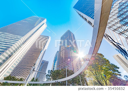 Urban buildings and trees 35450832