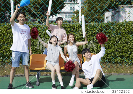Young woman, young man, friend, cheering Young woman, young man, friend, cheering 35452192