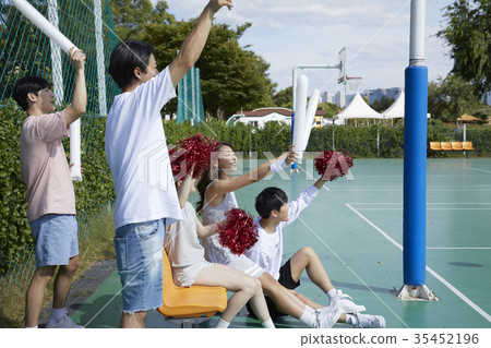Young woman, young man, friend, cheering Young woman, young man, friend, cheering 35452196