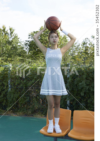 Young woman, sports, basketball Young woman, sports, basketball 35452302