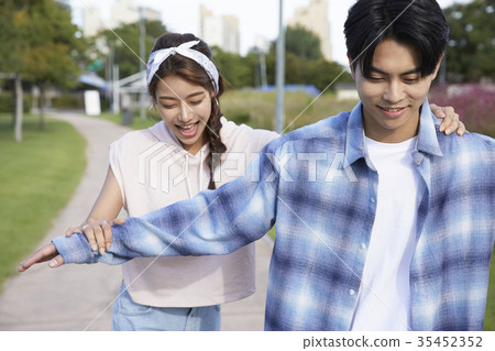 Young woman, young man, date Young woman, young man, date 35452352