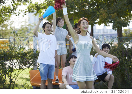 Young woman, young man, friend, cheering Young woman, young man, friend, cheering 35452694