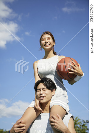 Young man, young woman, basketball, sports Young man, young woman, basketball, sports 35452760