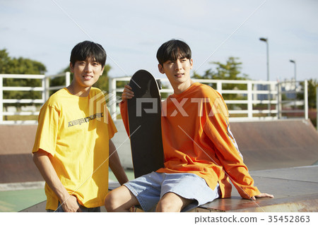 Young man, friend, skateboard 35452863