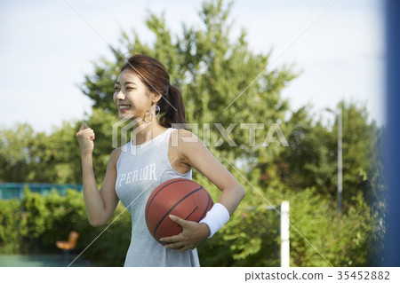 Young woman, sports, basketball Young woman, sports, basketball 35452882