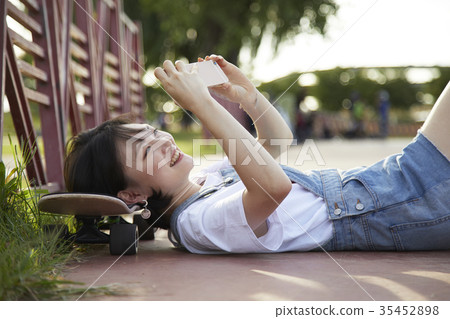 Young woman, sport, skateboarding Young woman, sport, skateboarding 35452898