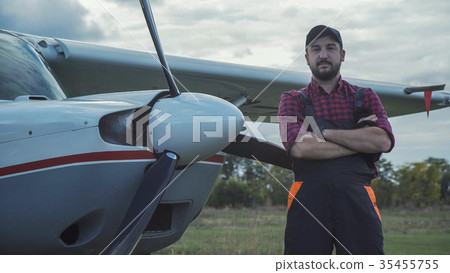 Aircraft mechanic looking at camera 35455755