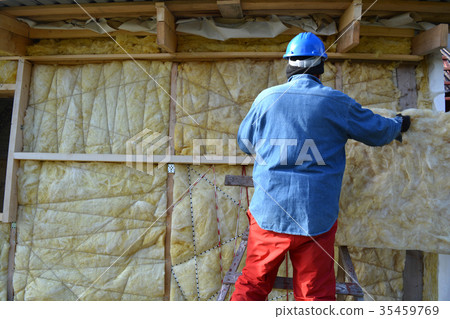 Builder  insulating house with mineral  wool 35459769