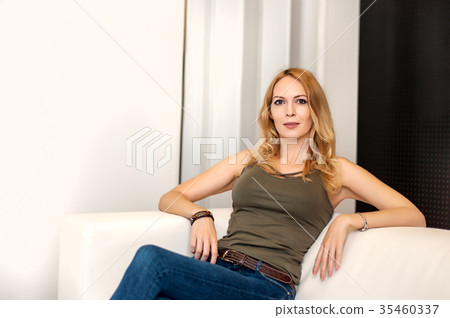 Gorgeous girl with beautiful face sitting Gorgeous girl with beautiful face sitting 35460337