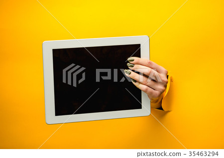 female teen hands using tablet pc with black 35463294